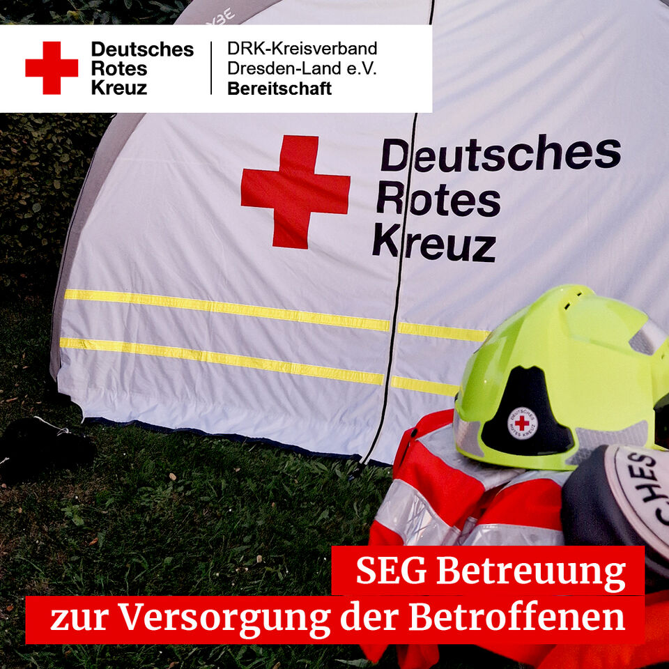 Betreuungszelt, Einsatzjacke und Einsatzhelm des DRK